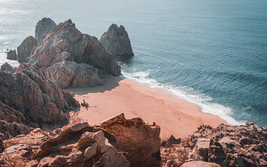 beach-rocks-ocean-sand